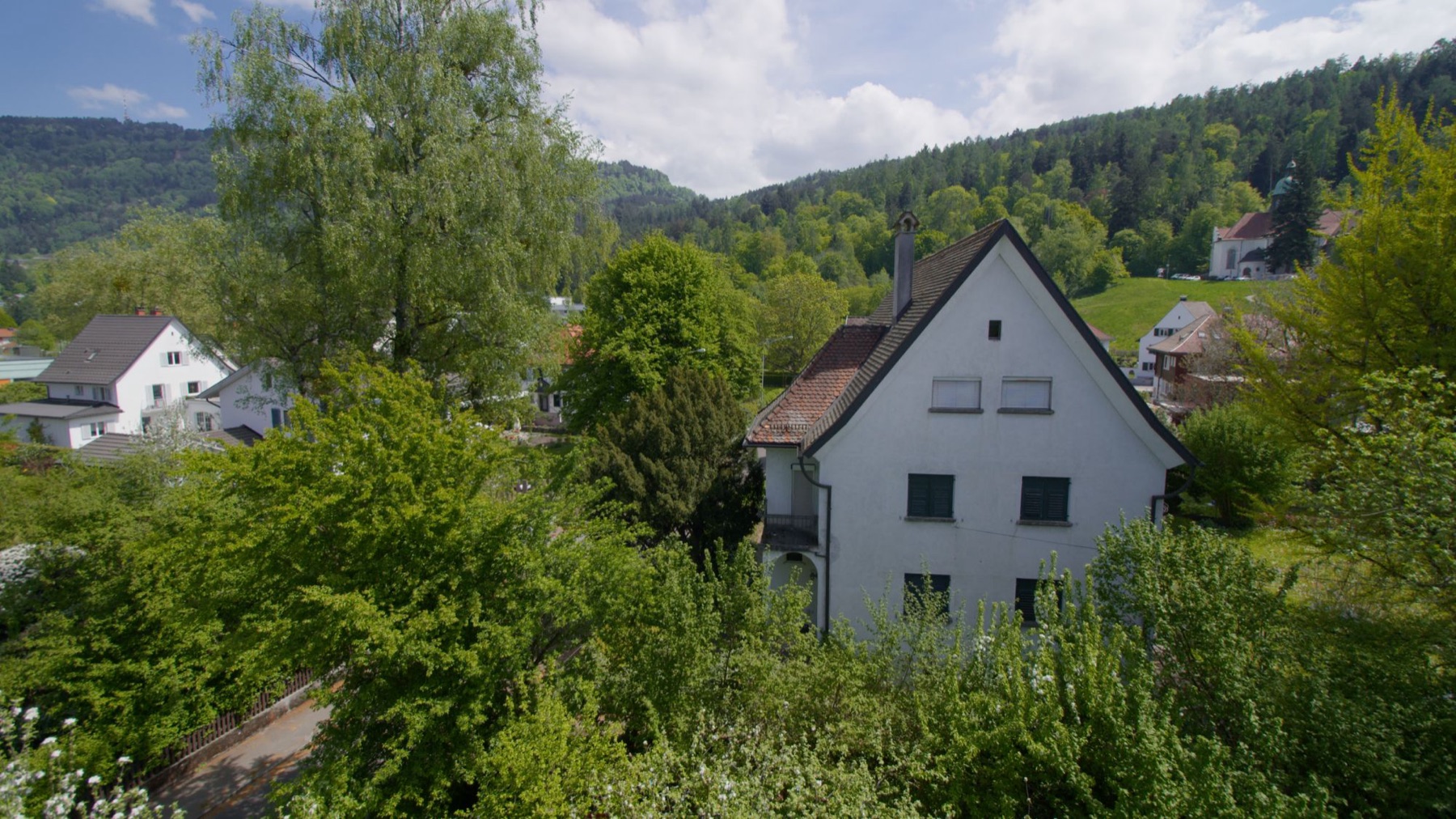 View across the neighbourhood towards the church