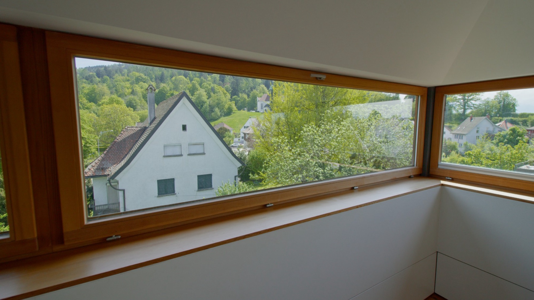 Panorama window with a view of the greenery